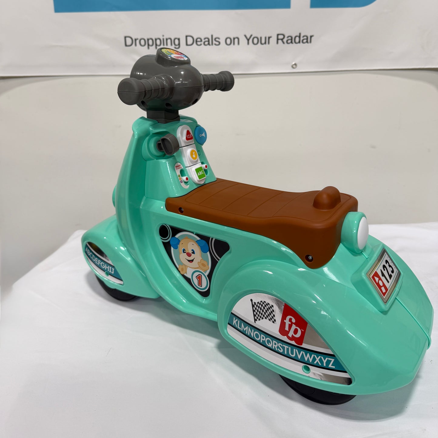 Fisher Price Laugh & Learn Smart Stages Cruise Along Scooter Side View